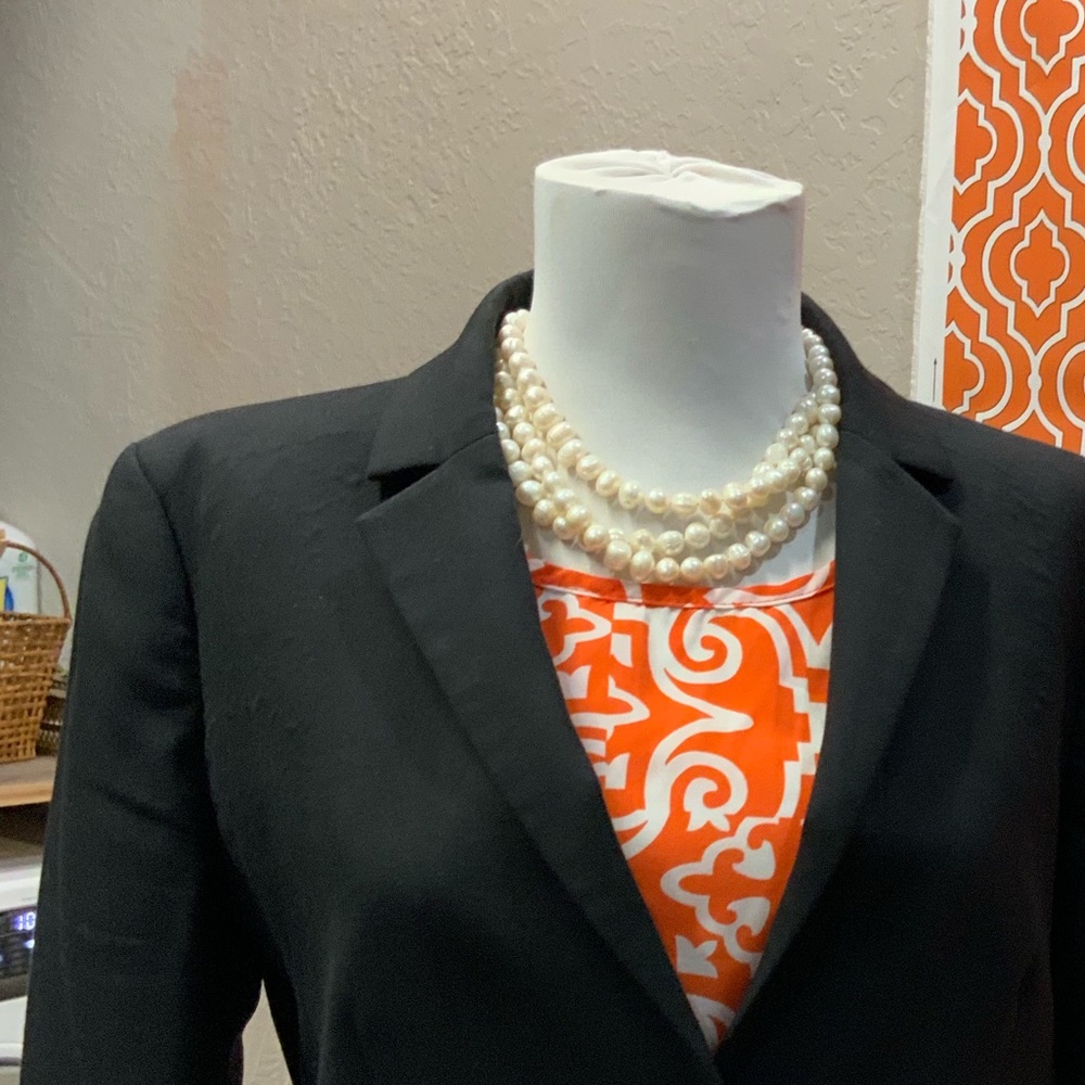 Tank orange and white with keyhole in back.